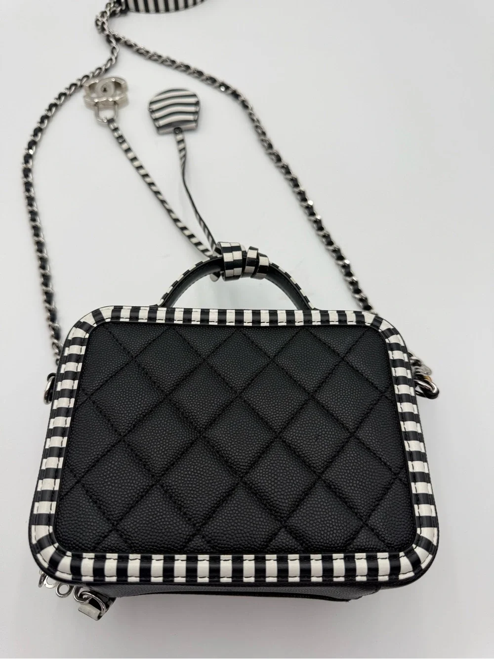 Chanel black and white filigree vanity bag in caviar leather